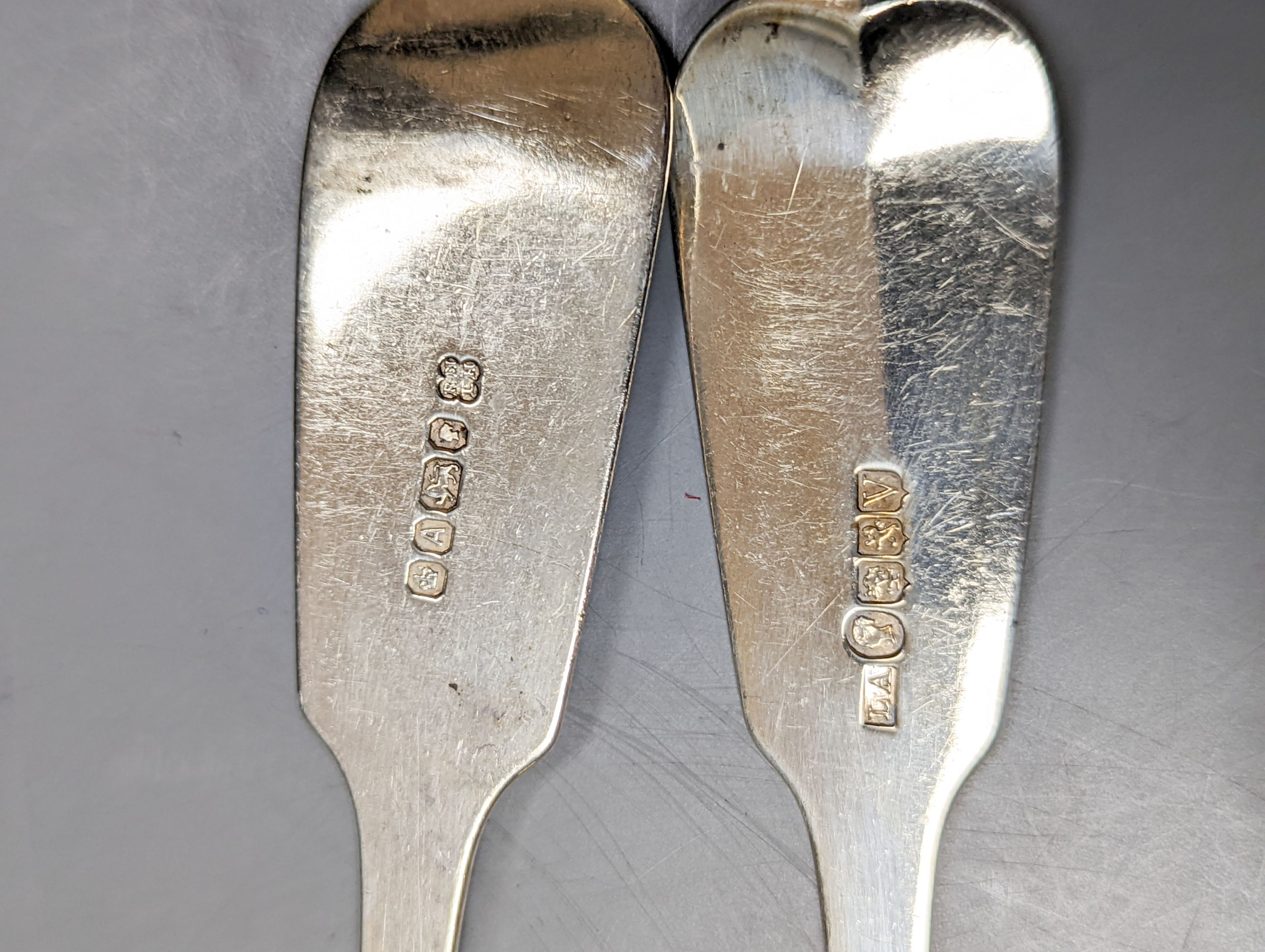 A matched pair of Victorian silver fish servers, Martin, Hall & Co, Sheffield, 1868 and Lawrence Aitchison, Glasgow, 1840, 9oz.